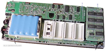 &quot;The upper side of the logic board holds the battery, the four ROM sockets as well as two piggi-back cards, the Serial interface card (1) and the 128 KB RAM card (2).&quot;